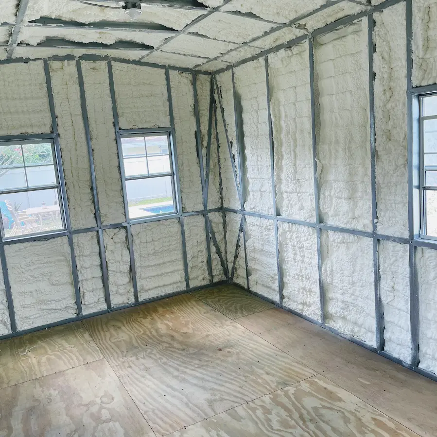 Closed-cell spray foam insulation applied to wall cavities in a residential project in Moosic